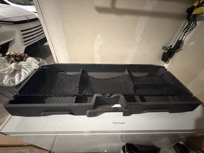 Nissan Frontier storage bin