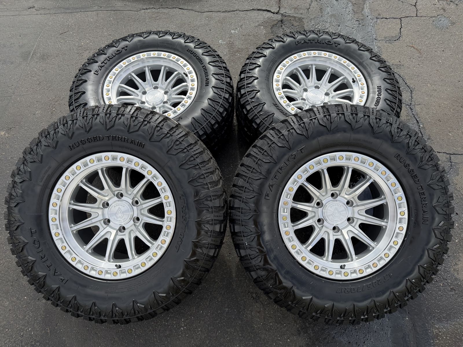 New LT295/70r17 RT Silver Arena 6x135 Ford F150 6