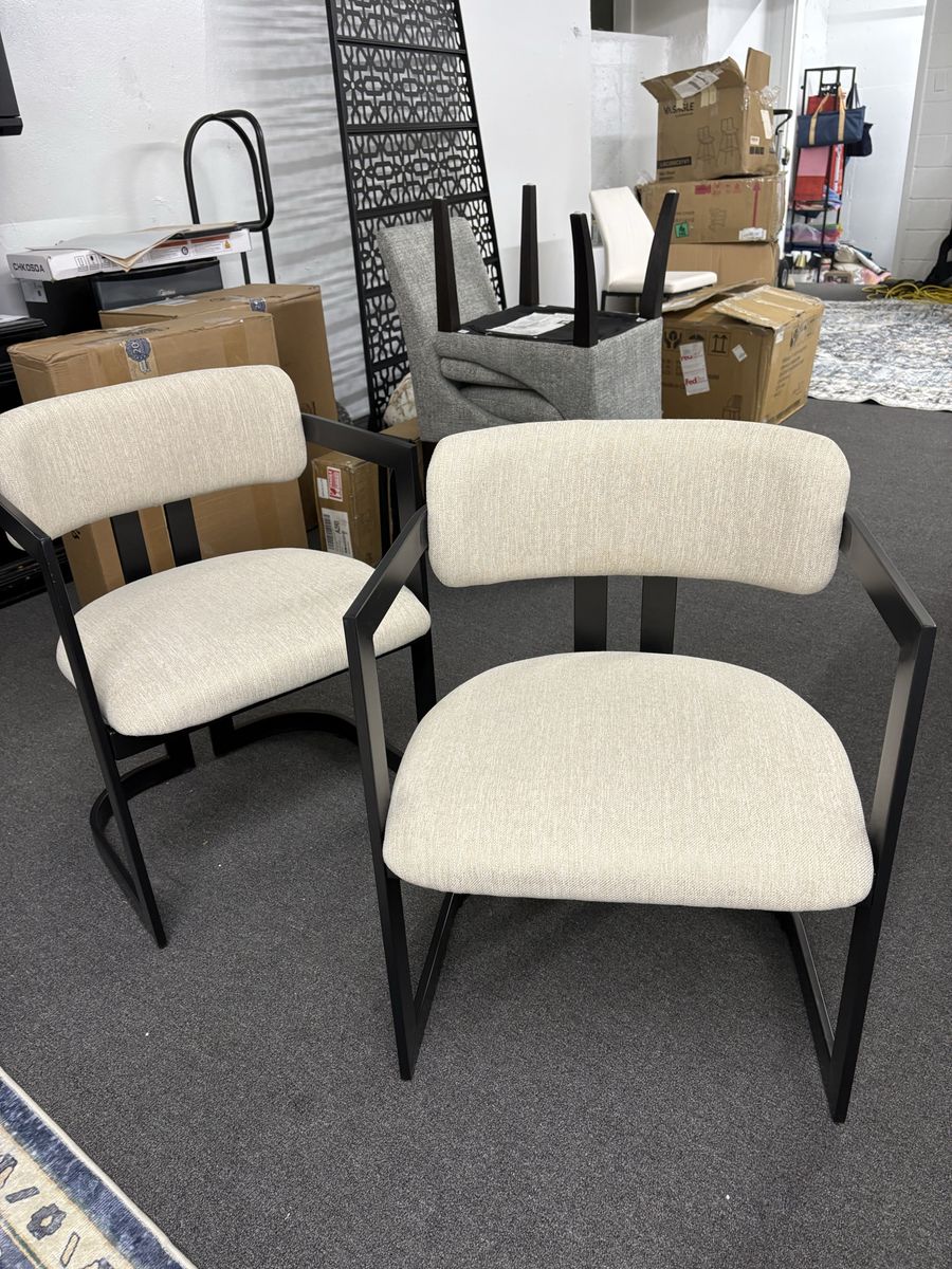 2  white modern chairs