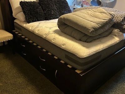 Bed with storage beneath