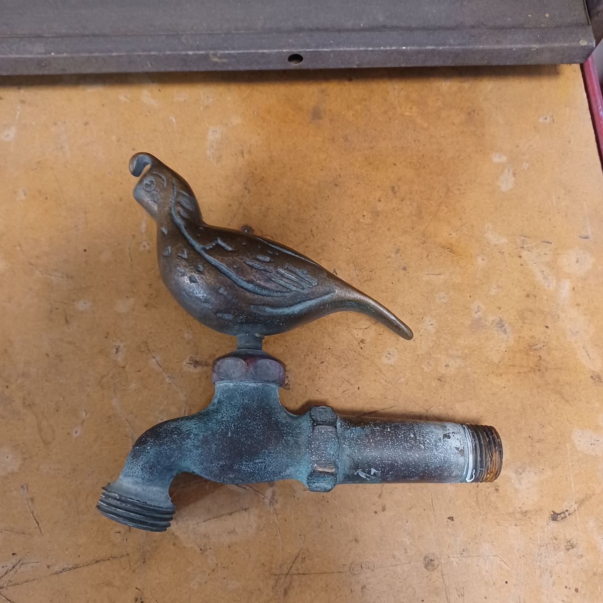 Brass bird faucet