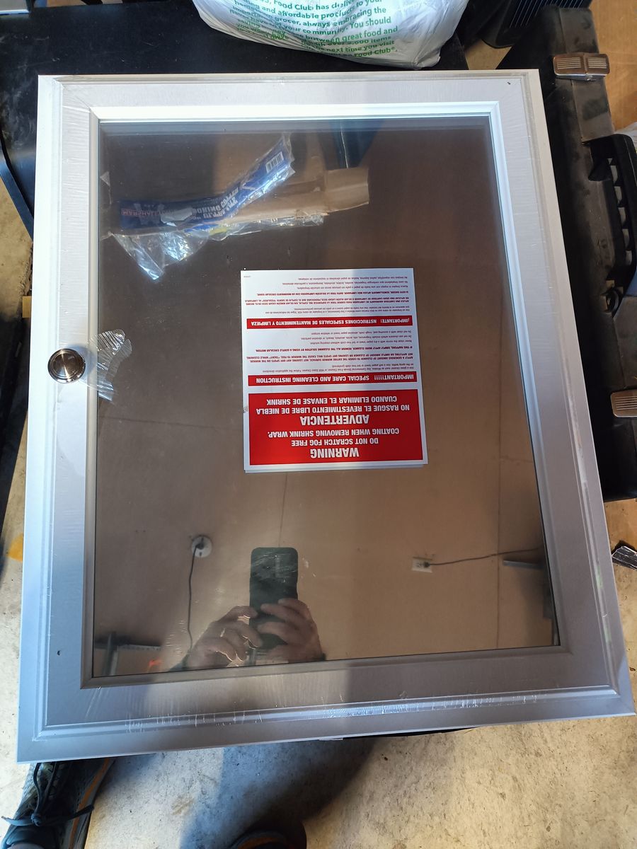 New in wall bathroom mirrored vanity.