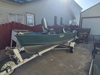 Tohatsu FI Outboard Motor with 14 ft Aluminum Fishing Boat and Trailer