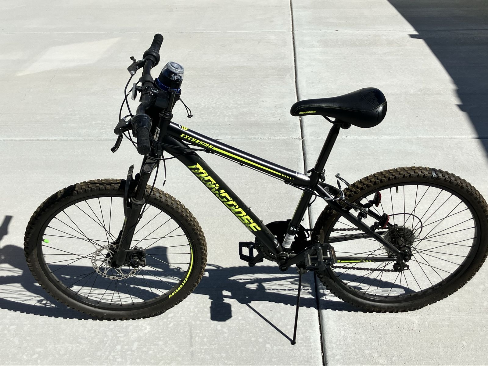 Mongoose Excursion Mountain Bike - 24 inch youth bike, Black/Yellow, 24 Inch Wheels