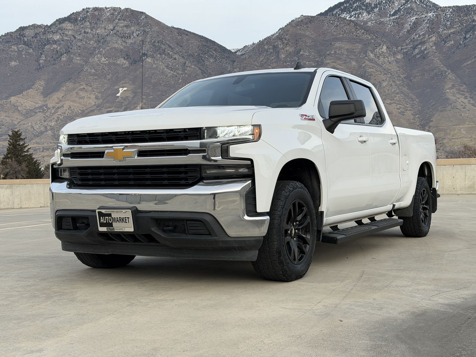 2022 Chevrolet Silverado 1500 LT — rebuilt & branded title, 17% below market