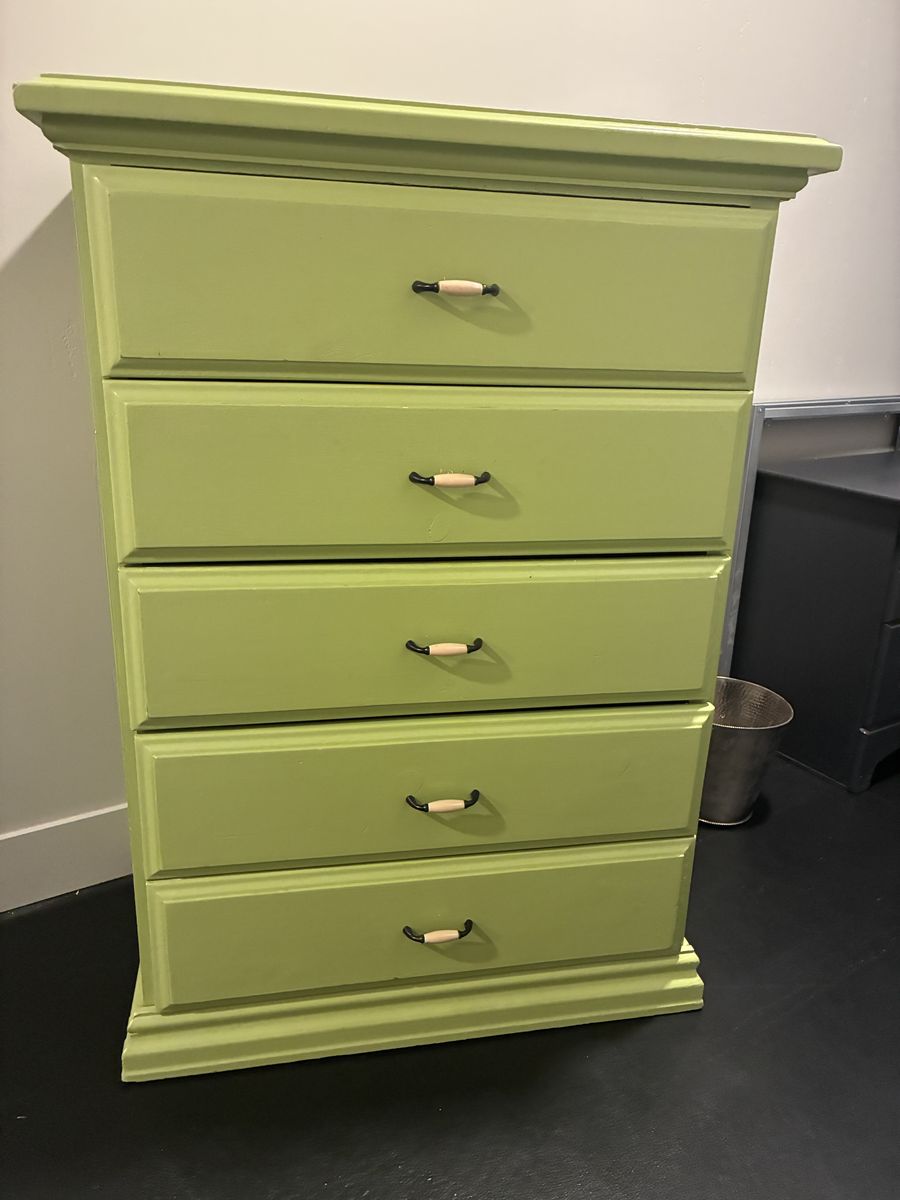 Solid wood dresser. 5 drawers, 44” high and 32” wide.
