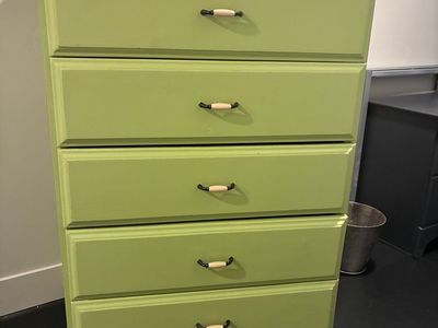 Solid wood dresser. 5 drawers, 44” high and 32” wide.