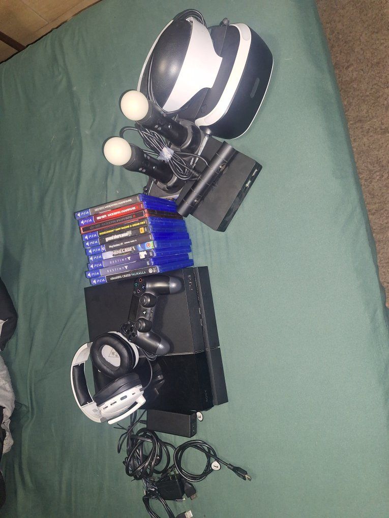 Playstation 4 with vr set headphones and games 275 OBO