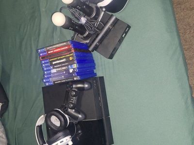 Playstation 4 with vr set headphones and games 275 OBO