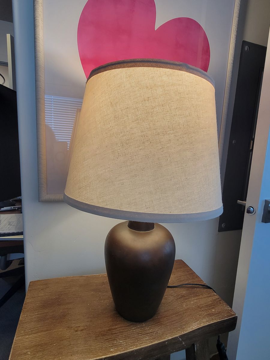 Two lamps brown base textured cream shade