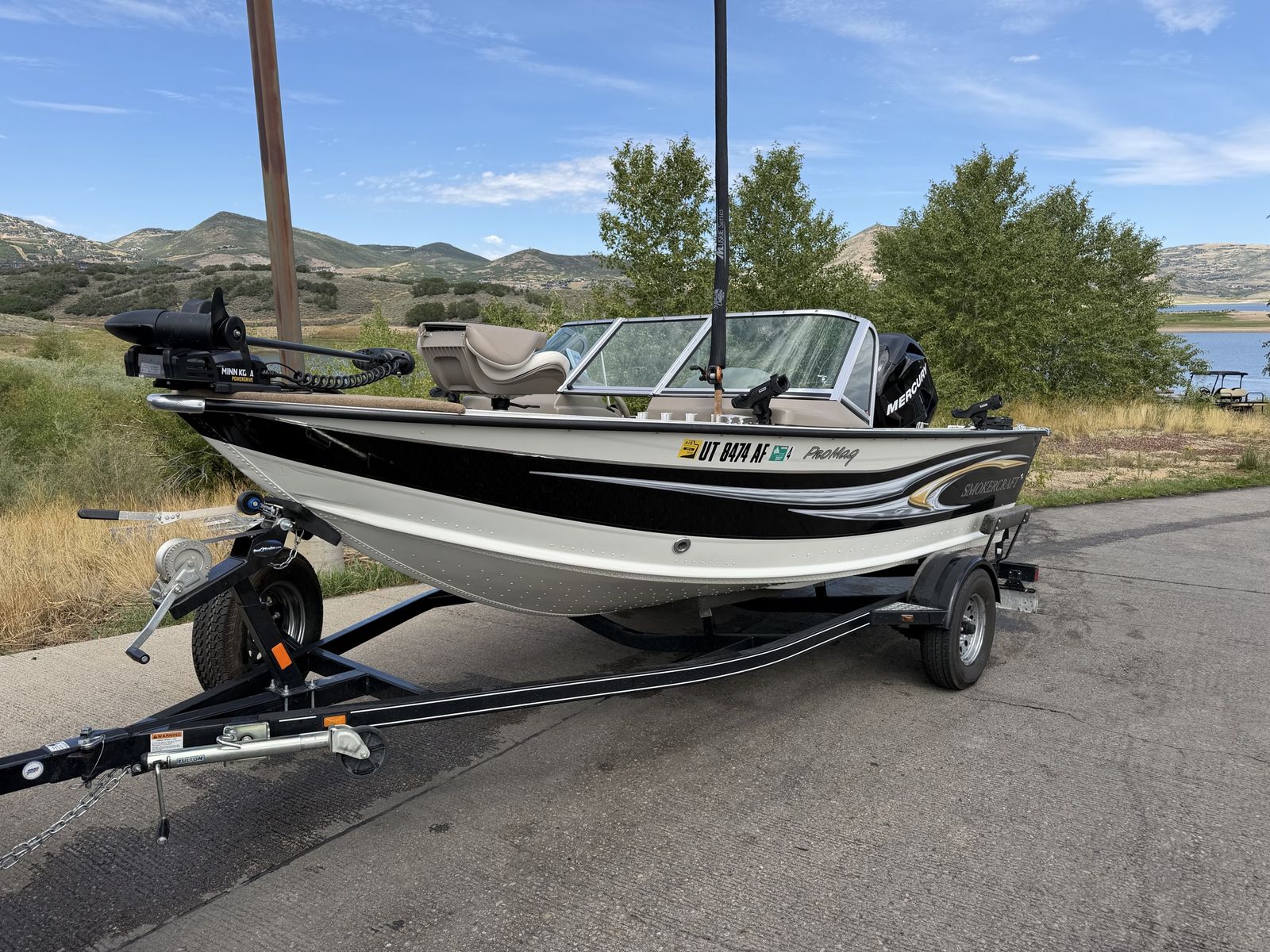 Smoker Craft ProMag 162 Fishing Boat with Mercury 90 Outboard & Trailer