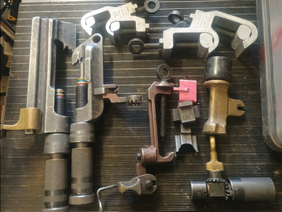 Ampact powder actuated power line connectivity tools