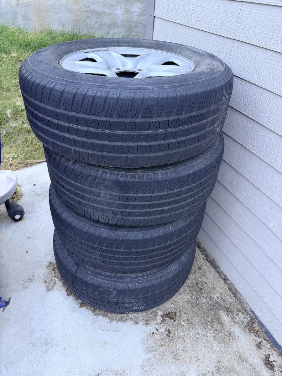 Four 265/65/R18 tires and Tundra wheels