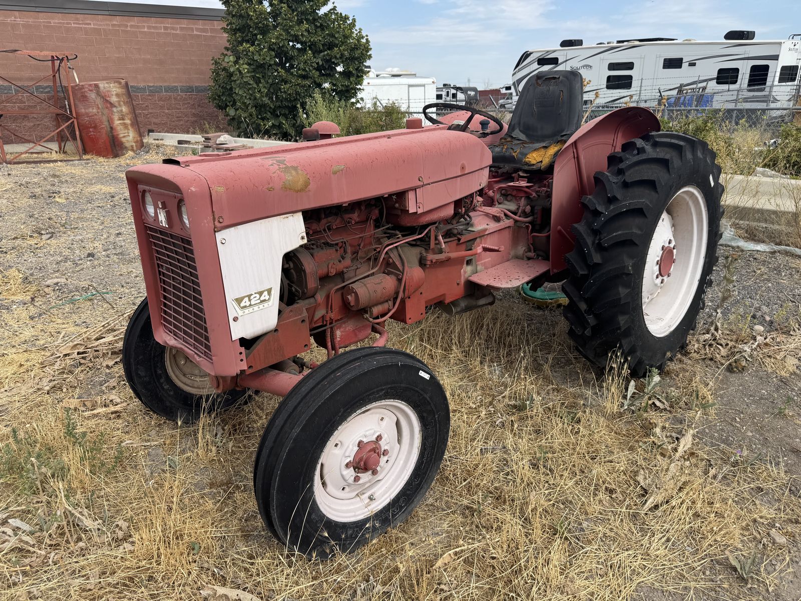 International 424 Tractor with Disc and Middlebuster