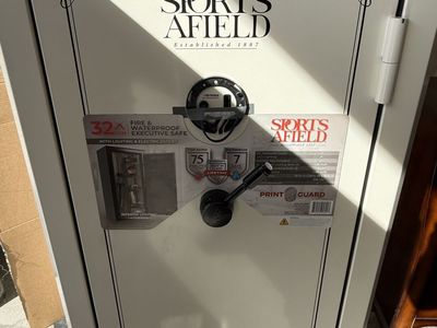 Brand new 32 gun Sports Afield safe