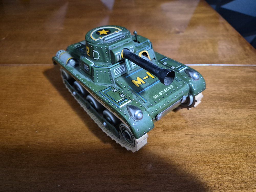 vintage Masudaya M-12 tin litho wind-up tank made in Japan, likely dating from the 1950s or 1960s. (Not keys)