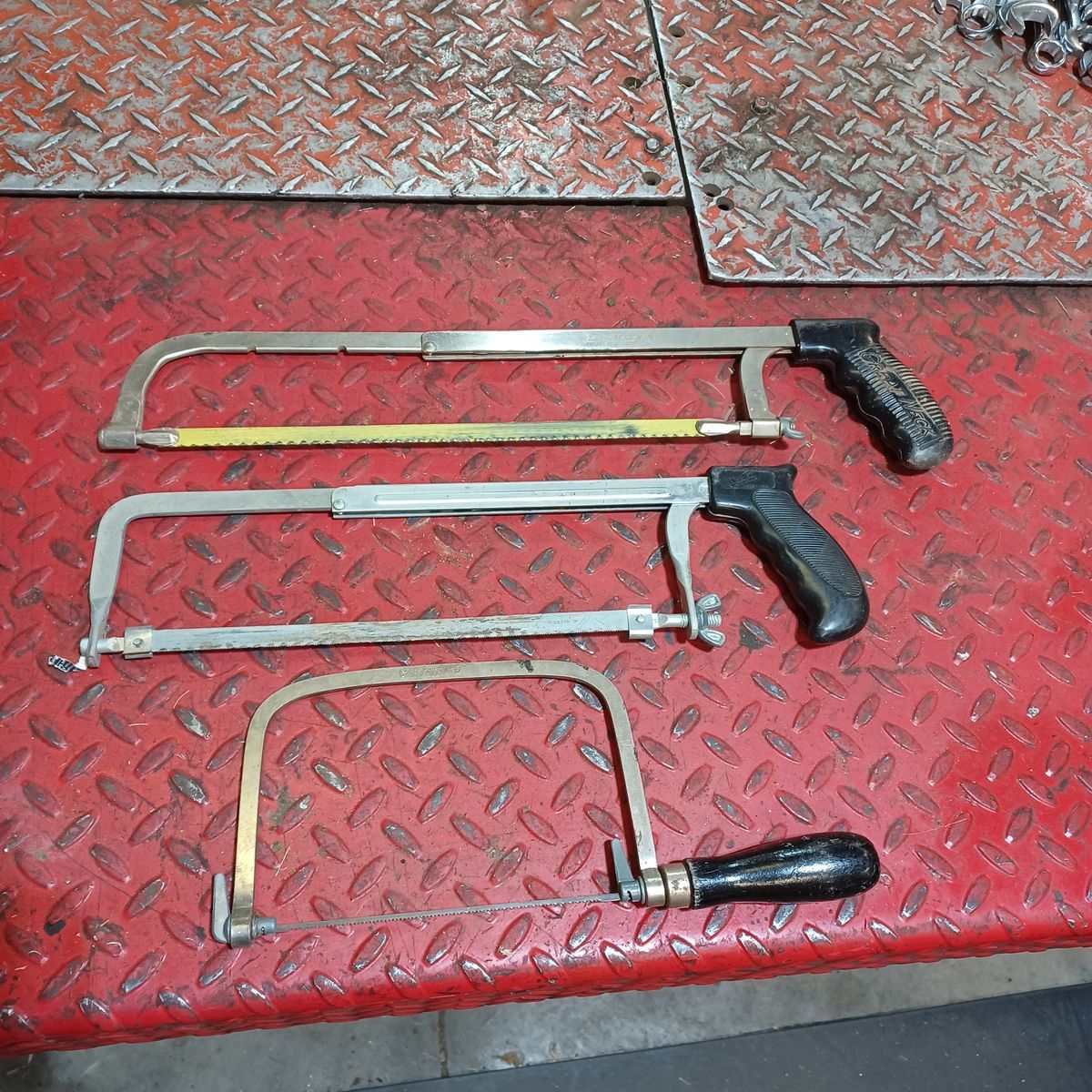 Three hand saws