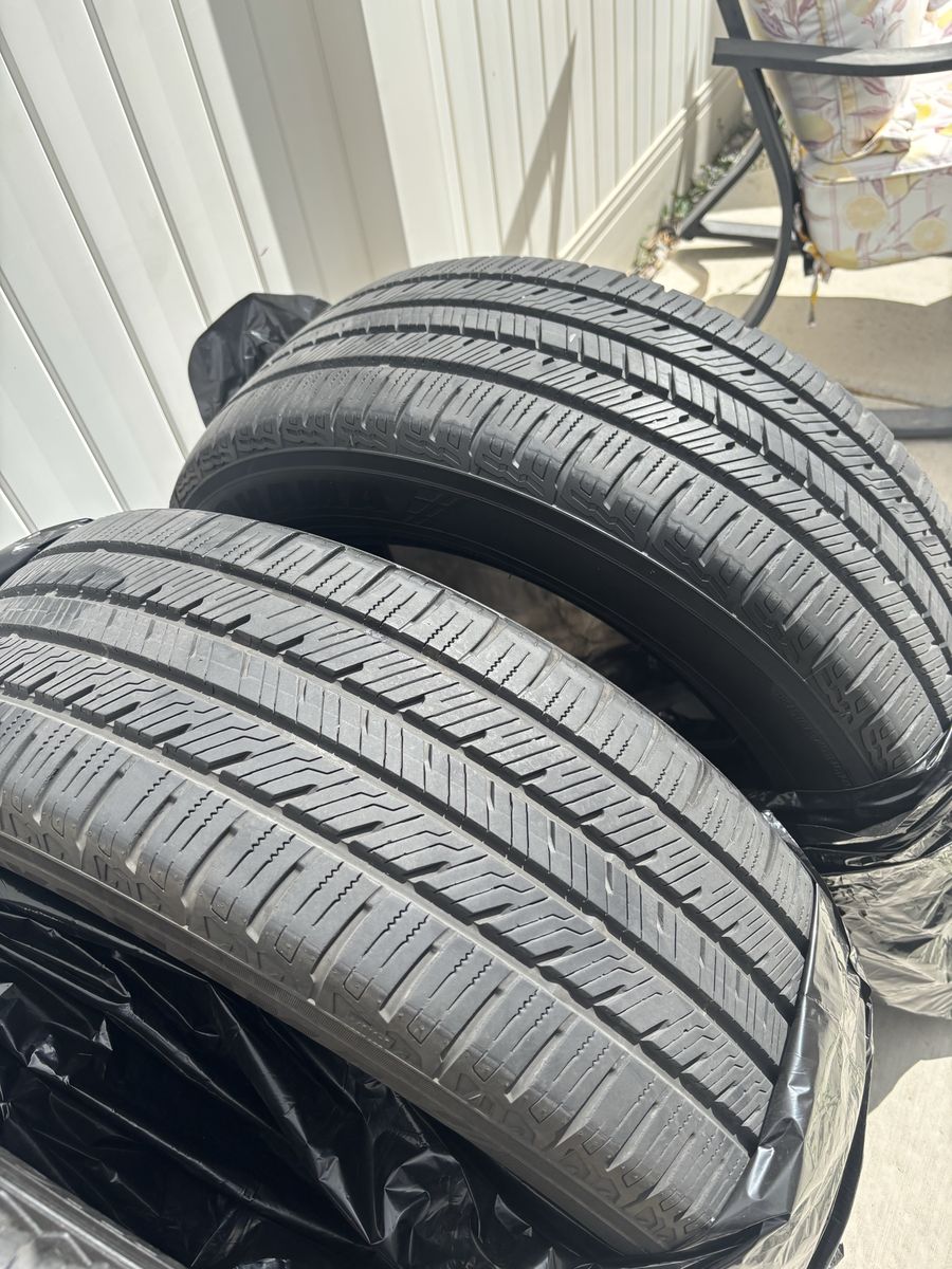 Pair of Used All-Season Tires - Good Tread, Ready for Installation