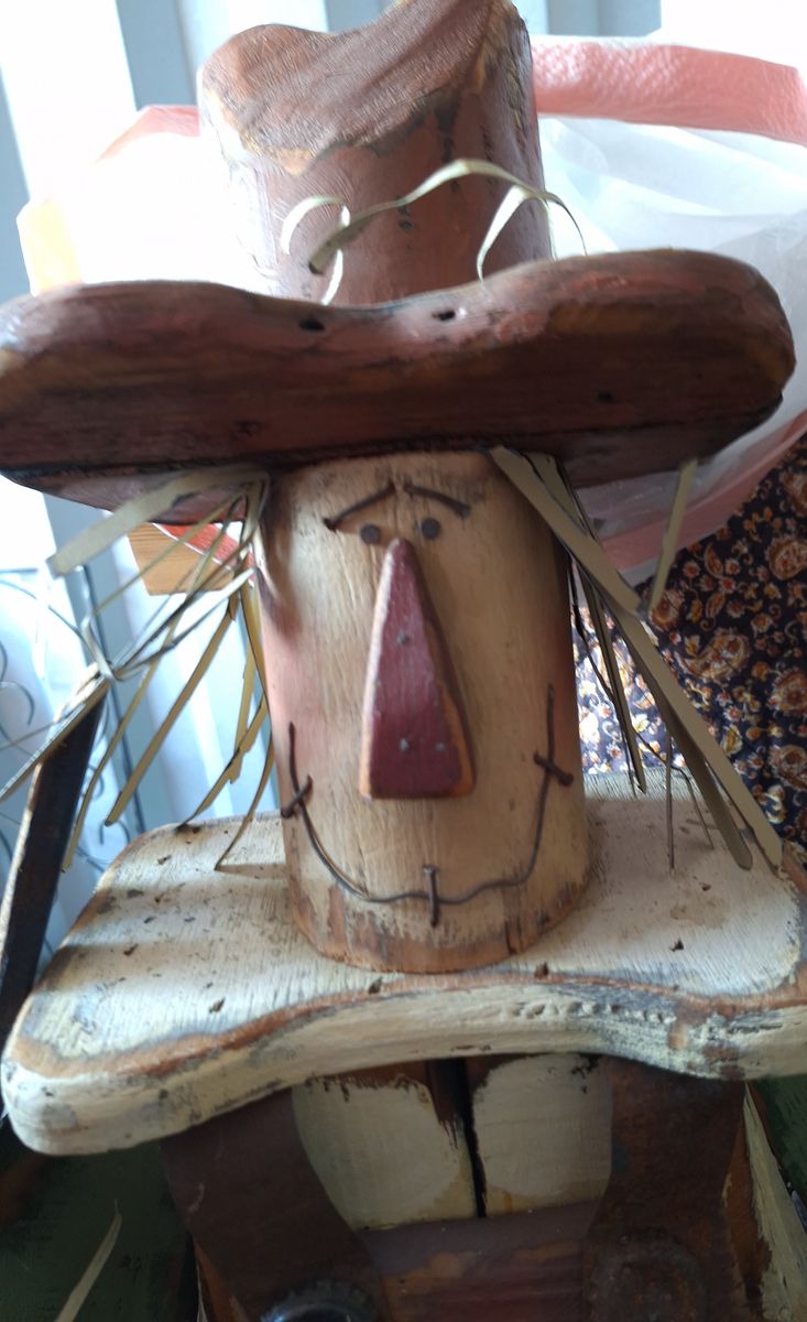 Vintage fall or halloween Wooden scarecrow