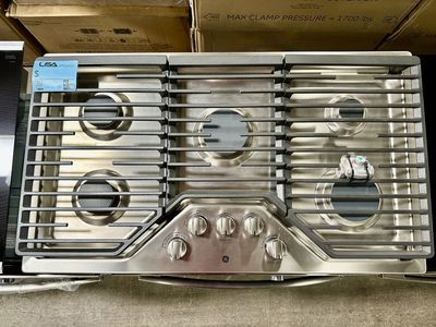 GE BUILT IN GAS COOKTOP WITH WARRANTY