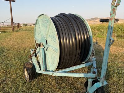 Micro rain, self retracting irrigation sprinkler