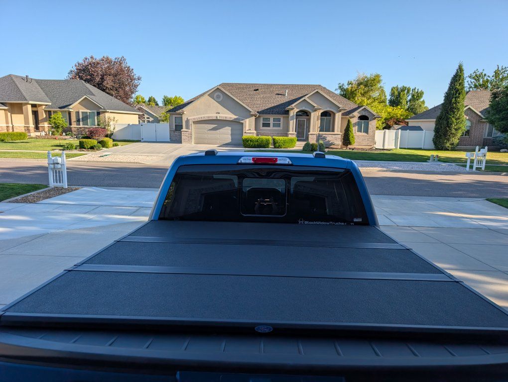 F-150 2021-2026 5.5ft Hard Folding Over the Bedrails Truck Bed Cover by RealTruck Advantage.  Ford part # VML3Z84501A42E