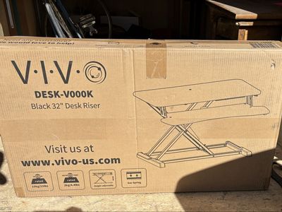Brand new, unopened Vivo 32” desk