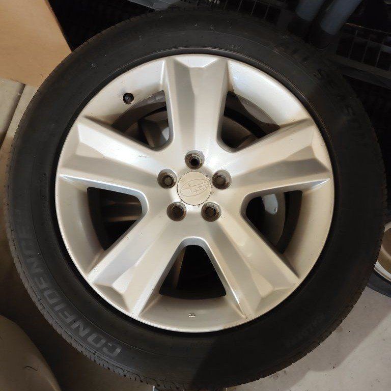 Stock Subaru wheels with tires