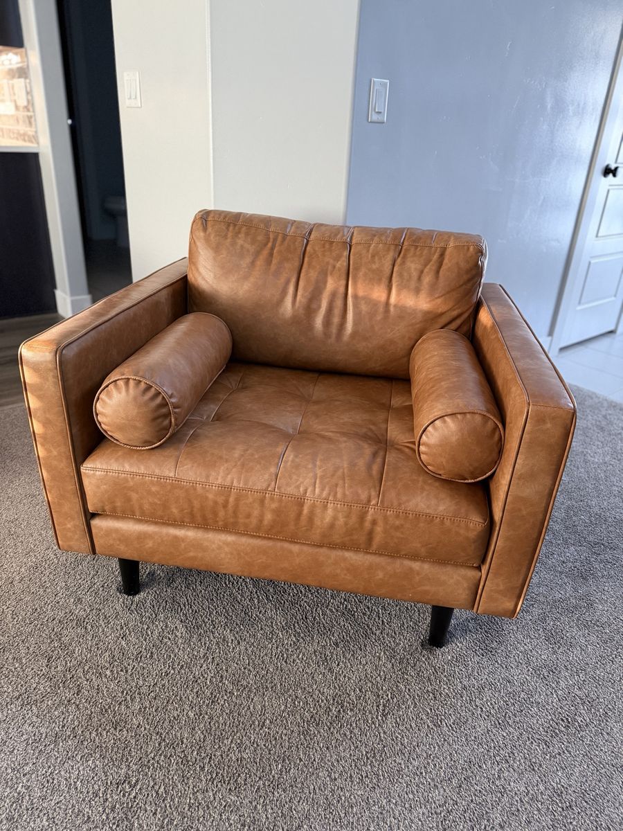 Modern Tan Faux 2 Leather Sofas with Tufted Seating & Bolster Pillows and chair