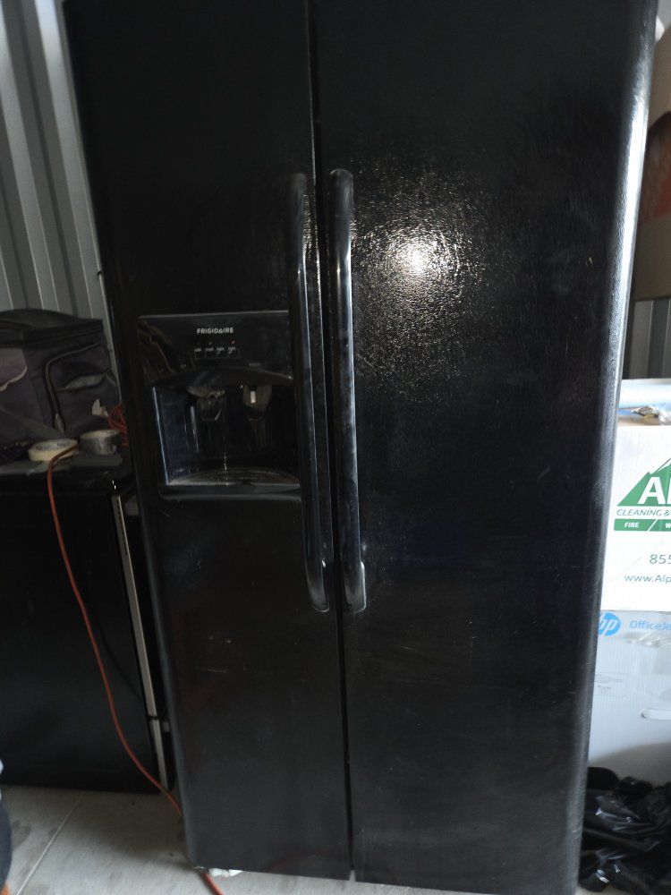 Frigidaire Side-by-Side Refrigerator in Black with Ice and Water Dispenser