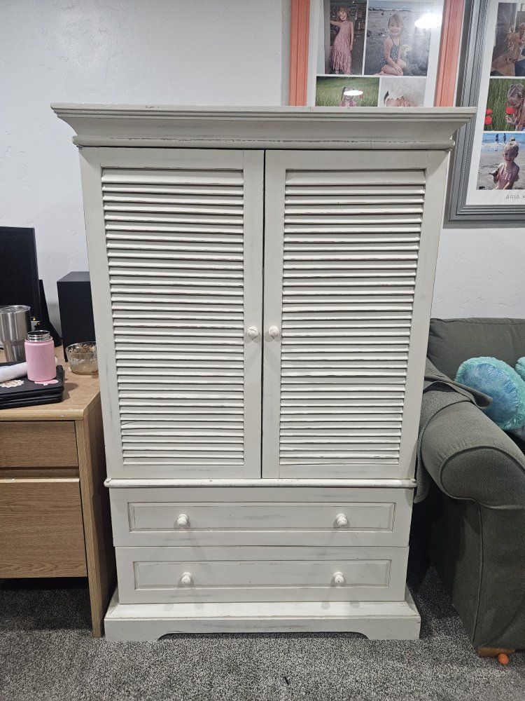 White Distressed Wooden Entertainment Armoire Cabinet with Shutter Doors and Drawers