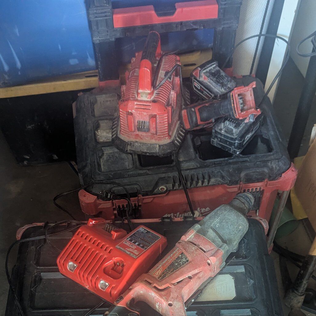 3 pack out boxes. hammer drill. drill 2 batteries