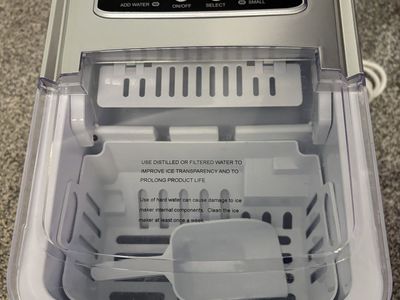 @ Insignia Ice Maker Portable with Auto Shut Off ModelNS-IMP26SLO