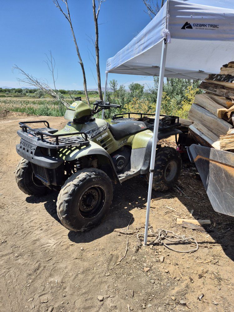 Polaris Sportsman 500 H.O and trailer