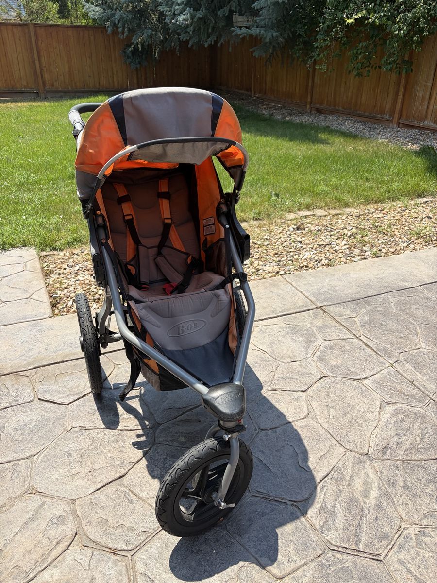 BOB Revolution SE Single Jogging Stroller - Orange/Gray with Gel Tubes
