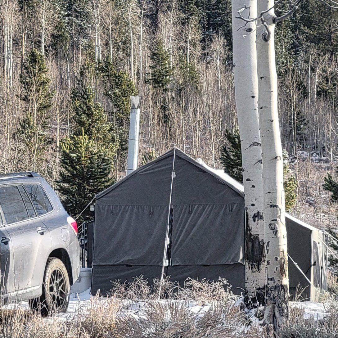 used 12X12 kodiac tent with stove.