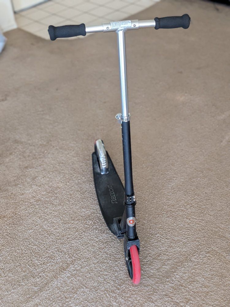 Razor Kick Scooter - Classic Folding Design with Red Wheels