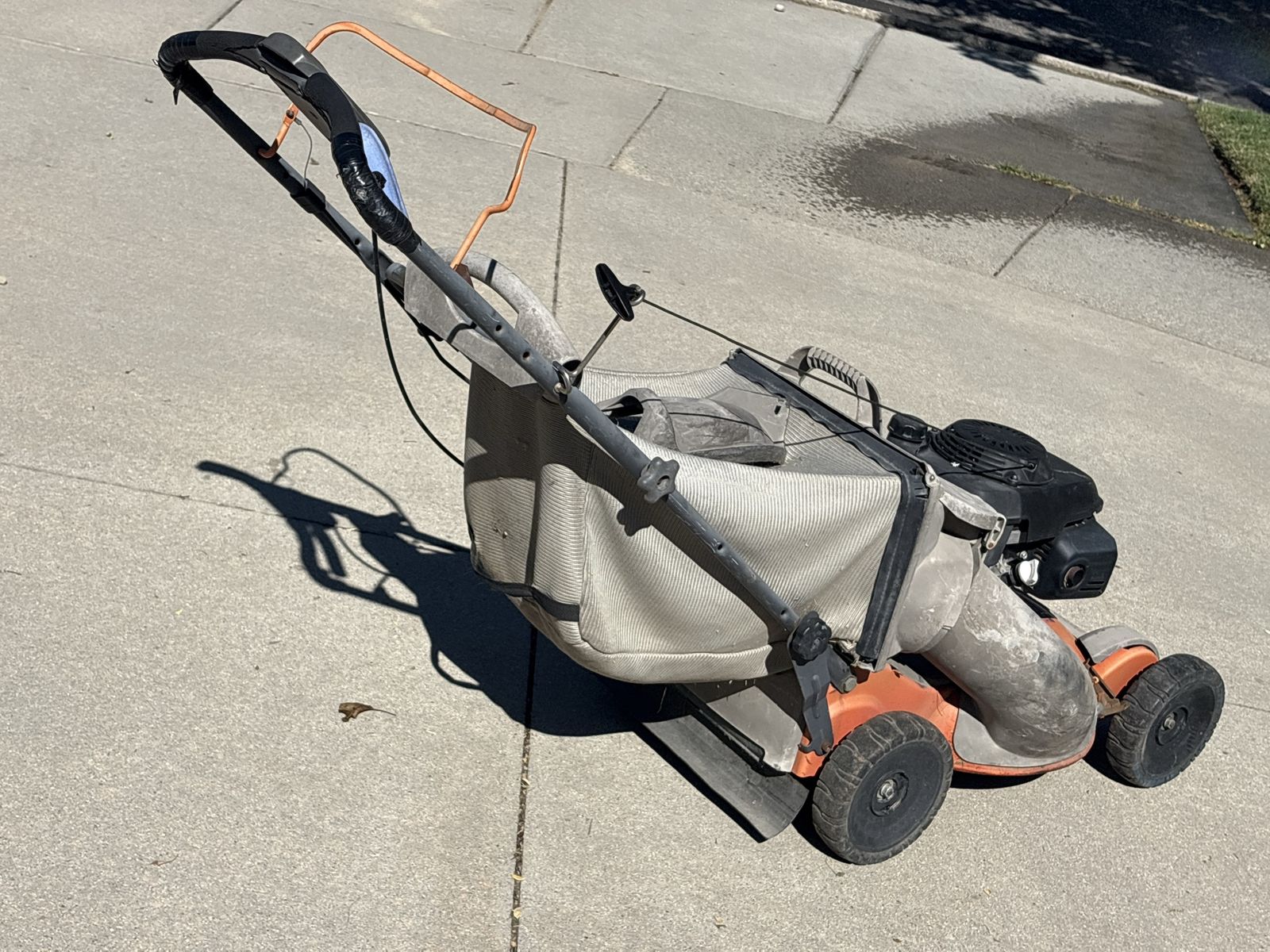 Husqvarna HiVac Lawn Mower with Auto Walk, Grass Bag and Mulch Plug