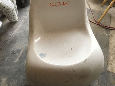 Vintage White Molded Plastic Accent Chair with Orange Leaf Branding