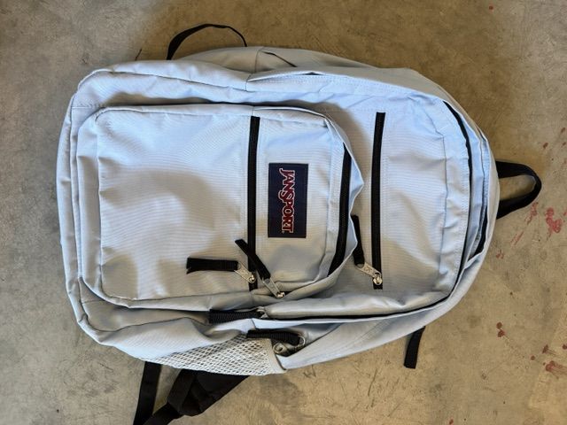 JanSport Light Blue Multi-Pocket Backpack with Black Straps