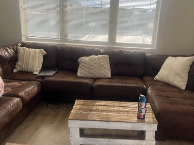 Ashley Furniture U-Shaped Sectional - Brown, Seats 8 - 8.5' x 6' x 12'
