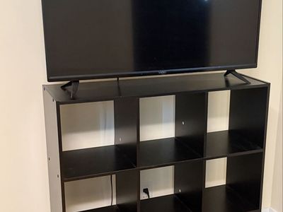 Vizio Smart TV and Black Cube Storage Shelf