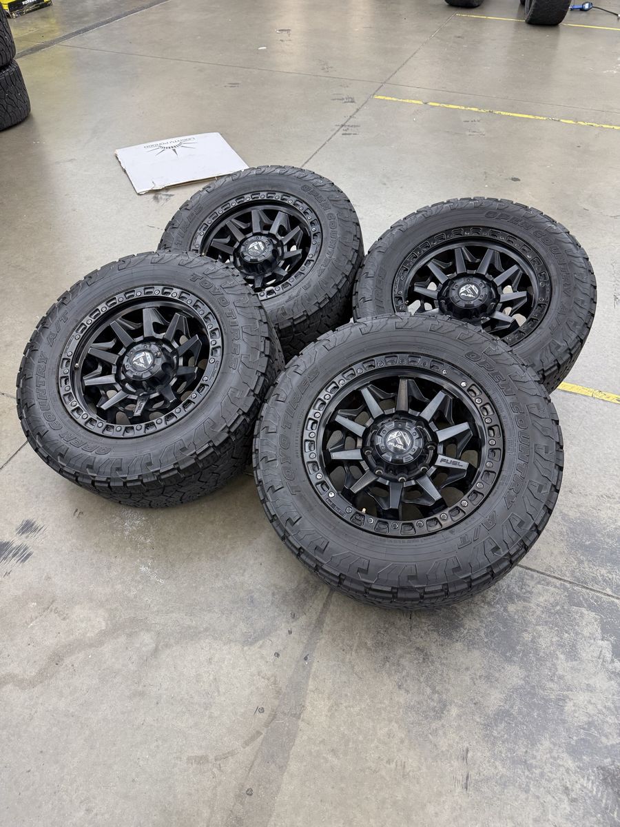 20x9 fuel “covert” wheels/ 295/60/20 Toyo at3 8x180