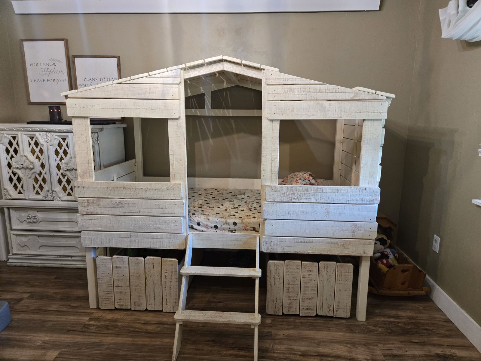 Tree house twin bed frame with matching storage bins