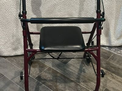 Burgundy 4-Wheel Folding Rollator Walker with Padded Seat and Hand Brakes