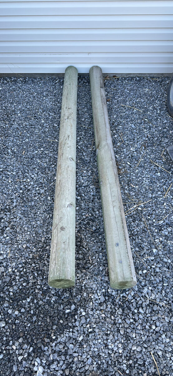 12 Wood posts, treated,