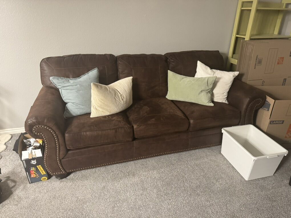 SELL ASAP - Brown Leather Couch w/ Pull out