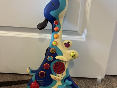 B. Toys Dog Guitar
