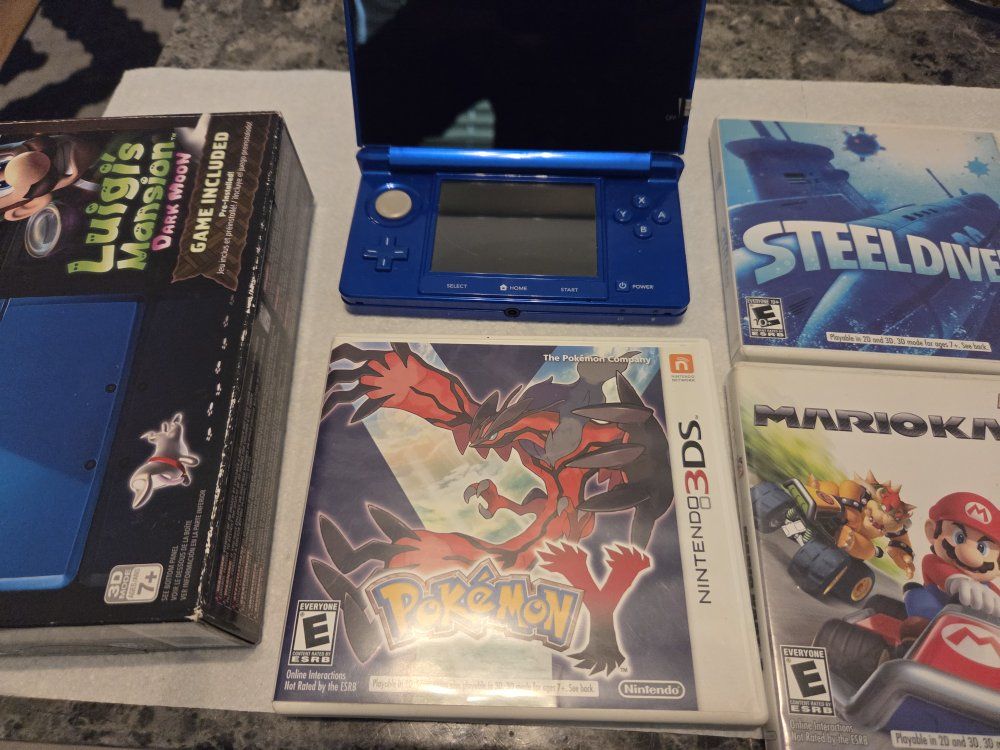 Luigi's mansion 3ds + Pokémon Y, Mario Kart7,Steel Diver.