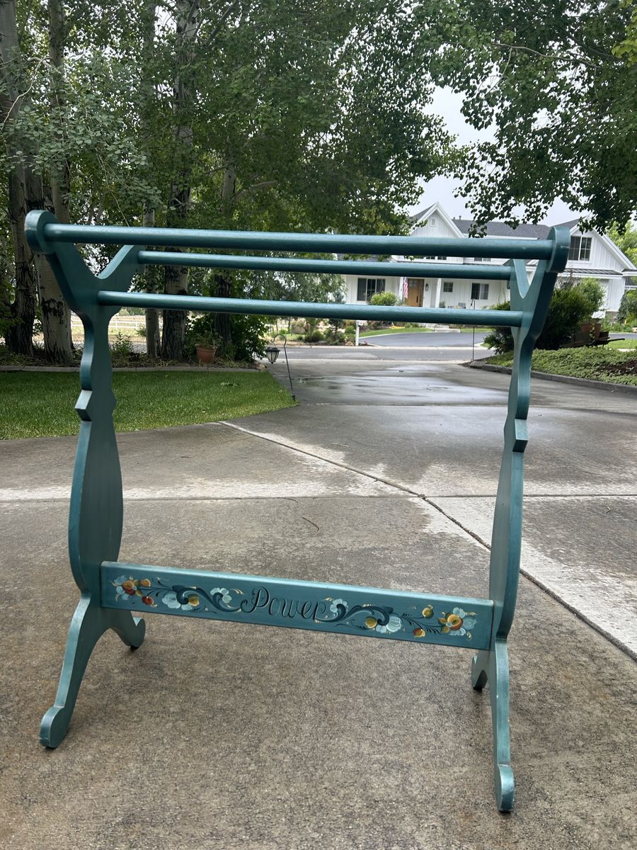 Antique quilt/blanket rack with hand painted rosemaling design.